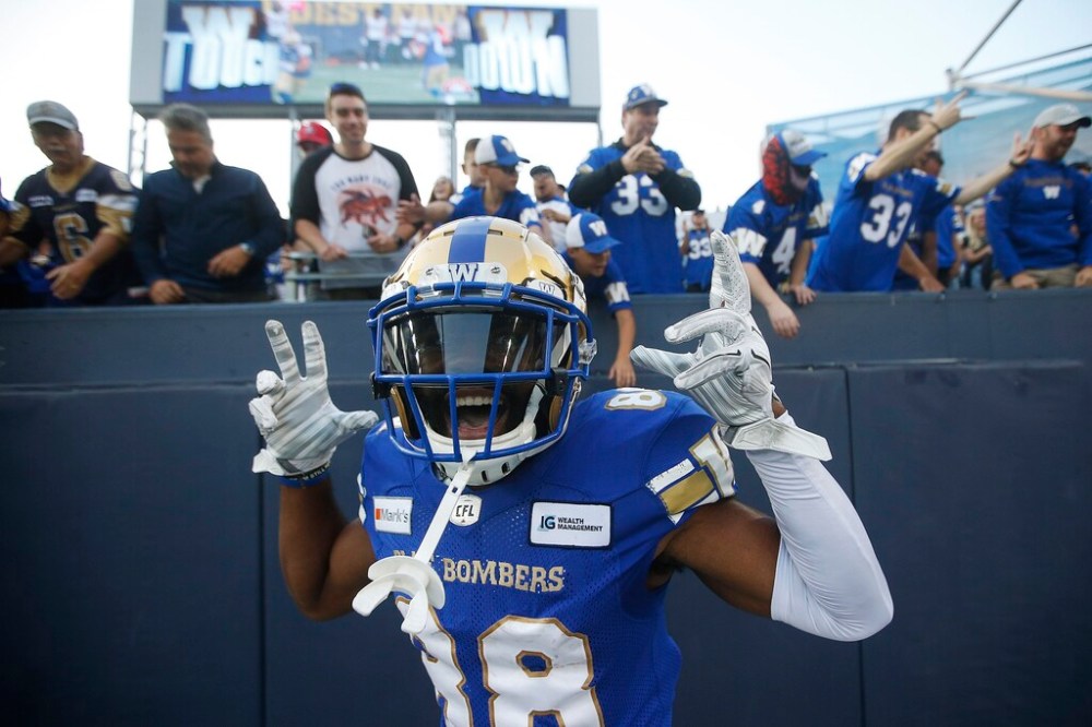 CP
Winnipeg Blue Bombers wide receiver Rasheed Bailey celebrates one of Kenny Lawler’s two touchdowns. (John Woods / The Canadian Press)