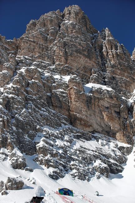 The start of the men's downhill course, at the alpine ski World Championships in Cortina d'Ampezzo, Italy, Friday, Feb. 12, 2021. To reach the start of the new men's downhill course in Cortina, skiers have to climb 223 steps at an altitude of 2,400 meters (8,000 feet). The course's name, Vertigine, translates to