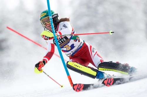 Austria's Katharina Liensberger speeds down the course during an alpine ski, women's World Cup slalom in Lenzerheide, Switzerland, Saturday, March 20, 2021. (AP Photo/Gabriele Facciotti)