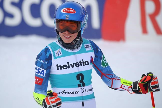 United States' Mikaela Shiffrin gets to the finish area after completing the first run of an alpine ski, women's World Cup giant slalom, in Lenzerheide, Switzerland, Sunday, March 21, 2021. (AP Photo/Marco Trovati)