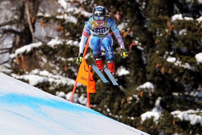 United States' Breezy Johnson speeds down the course during the women's downhill, at the alpine ski World Championships in Cortina d'Ampezzo, Italy, Saturday, Feb.13, 2021. (AP Photo/Marco Trovati)