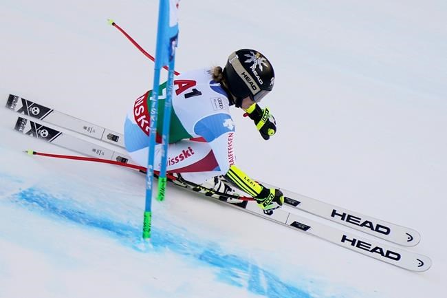 Switzerland's Lara Gut-Behrami speeds down the course during an alpine ski, women's World Cup super-G, in Bansko, Bulgaria, Sunday, Jan. 26, 2020. (AP Photo/Giovanni Auletta)