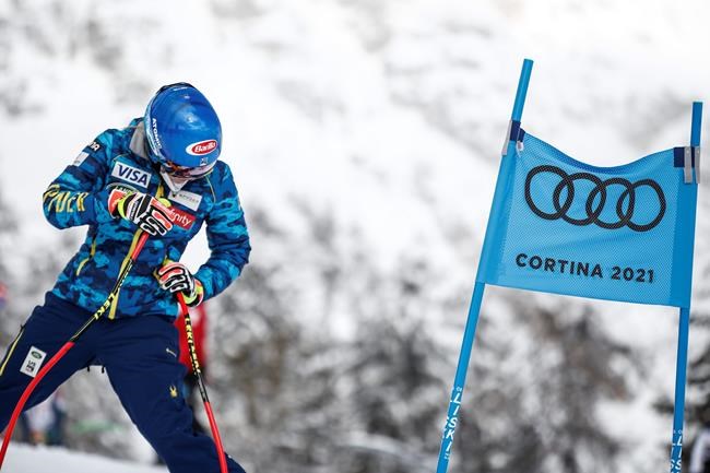 United States' Mikaela Shiffrin inspects the course prior to the women's super-G, at the alpine ski World Championships in Cortina d'Ampezzo, Italy, Tuesday, Feb. 9, 2021. (AP Photo/Gabriele Facciotti)
