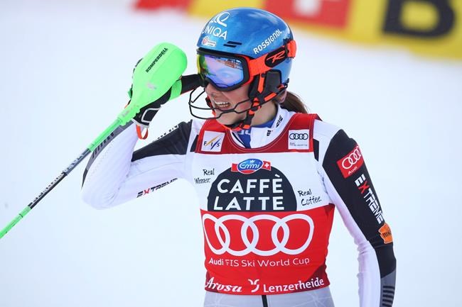 Slovakia's Petra Vlhova gets to the finish area after completing the first run of an alpine ski, women's World Cup slalom in Lenzerheide, Switzerland, Saturday, March 20, 2021. (AP Photo/Marco Trovati)