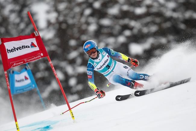 United States' Mikaela Shiffrin speeds down the course during an alpine ski, women's World Cup giant slalom, in Lenzerheide, Switzerland, Sunday, March 21, 2021. (AP Photo/Gabriele Facciotti)