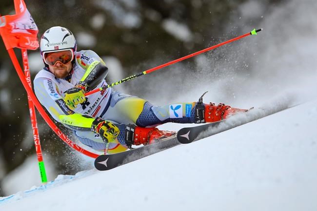 Norway's Aleksander Aamodt Kilde speeds down the course during an alpine ski, men's World Cup giant slalom in Alta Badia, Italy, Sunday, Dec.20, 2020. (AP Photo/Marco Trovati)