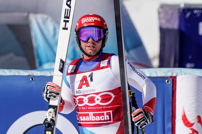 Switzerland's Beat Feuz gets to the finish area after completing alpine ski, men's World Cup downhill in Saalbach-Hinterglemm, Austria, Saturday, March 6, 2021. (AP Photo/Giovanni Auletta)