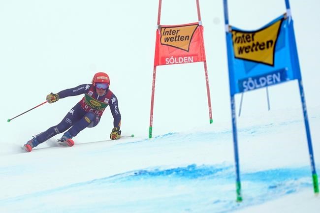 Italy's Federica Brignone speeds down the course during an alpine ski, women's World Cup giant slalom in Soelden, Austria, Saturday, Oct. 17, 2020. (AP Photo/Giovanni Auletta)