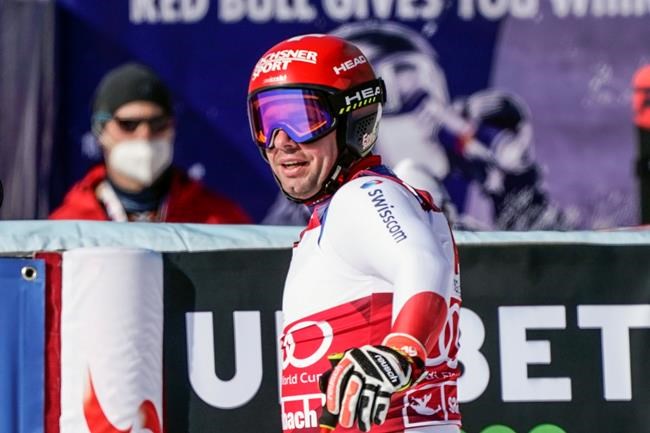 Switzerland's Beat Feuz gets to the finish area after completing alpine ski, men's World Cup downhill in Saalbach-Hinterglemm, Austria, Saturday, March 6, 2021. (AP Photo/Giovanni Auletta)