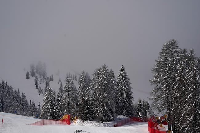 A view of the women's super-G course as the start of the race was delayed due to the fog, at the alpine ski World Championships in Cortina d'Ampezzo, Italy, Tuesday, Feb. 9, 2021. (AP Photo/Giovanni Auletta)