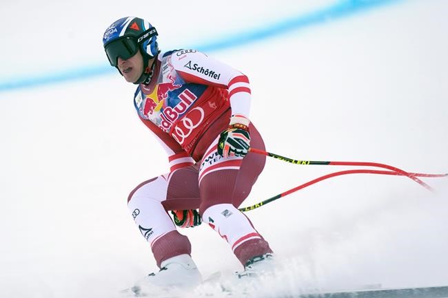 Austria's Matthias Mayer gets to the finish area after completing an alpine ski, men's World Cup downhill, in Kitzbuehel, Austria, Sunday, Jan. 24, 2021. (AP Photo/Giovanni Auletta)
