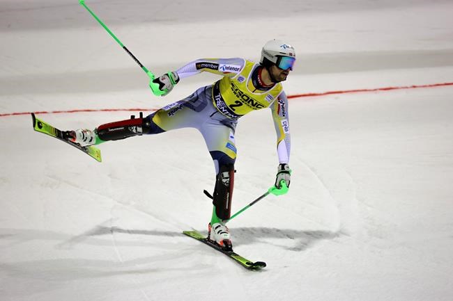 Norway's Sebastian Foss Solevaag crosses the finish line of an alpine ski, men's World Cup slalom in Madonna di Campiglio, Italy, Tuesday, Dec. 22, 2020. (AP Photo/Alessandro Trovati)