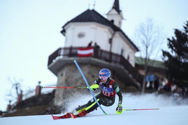 United States' Mikaela Shiffrin speeds down the course during an alpine ski, women's World Cup slalom in Lienz, Austria, Sunday Dec. 29, 2019. (AP Photo/Marco Trovati)