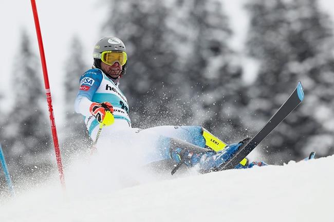 United States' Benjamin Ritchie loses his balance during an alpine ski, men's World Cup slalom, in Lenzerheide, Switzerland, Sunday, March 21, 2021. (AP Photo/Gabriele Facciotti)