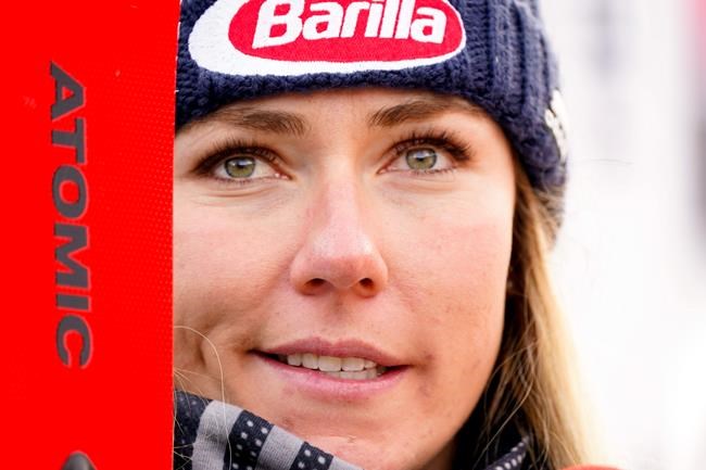 United States' Mikaela Shiffrin stands in the fish Rea after winning an alpine ski, women's World Cup super-G, in Bansko, Bulgaria, Sunday, Jan. 26, 2020. (AP Photo/Giovanni Auletta)