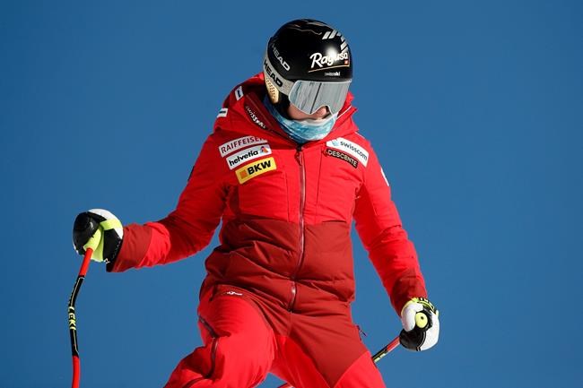 Switzerland's Lara Gut-Behrami inspects the course prior to an alpine ski, women's World Cup super-G, in Crans Montana, Switzerland, Sunday, Jan. 24, 2021. (AP Photo/Gabriele Facciotti)