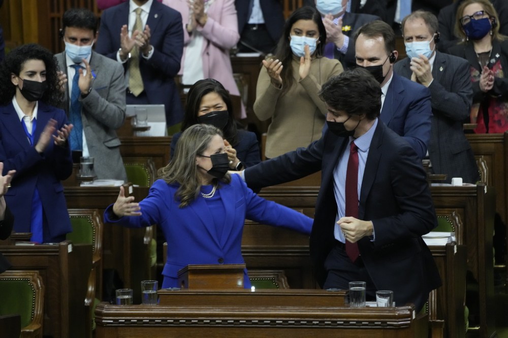 Finance Minister Chrystia Freeland hugs Prime Minister Justin Trudeau after tabling the federal budget in the House of Commons in Ottawa, Thursday, April 7, 2022. THE CANADIAN PRESS/Adrian Wyld