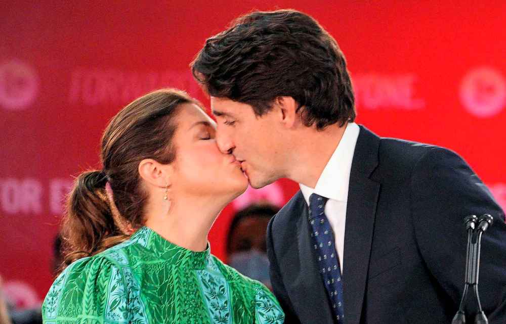 The Canadian Press
Prime Minister Justin Trudeau kisses his wife Sophie Gregoire Trudeau during his victory speech at Party campaign headquarters in Montreal, early Tuesday, Sept. 21, 2021. THE CANADIAN PRESS/Paul Chiasson