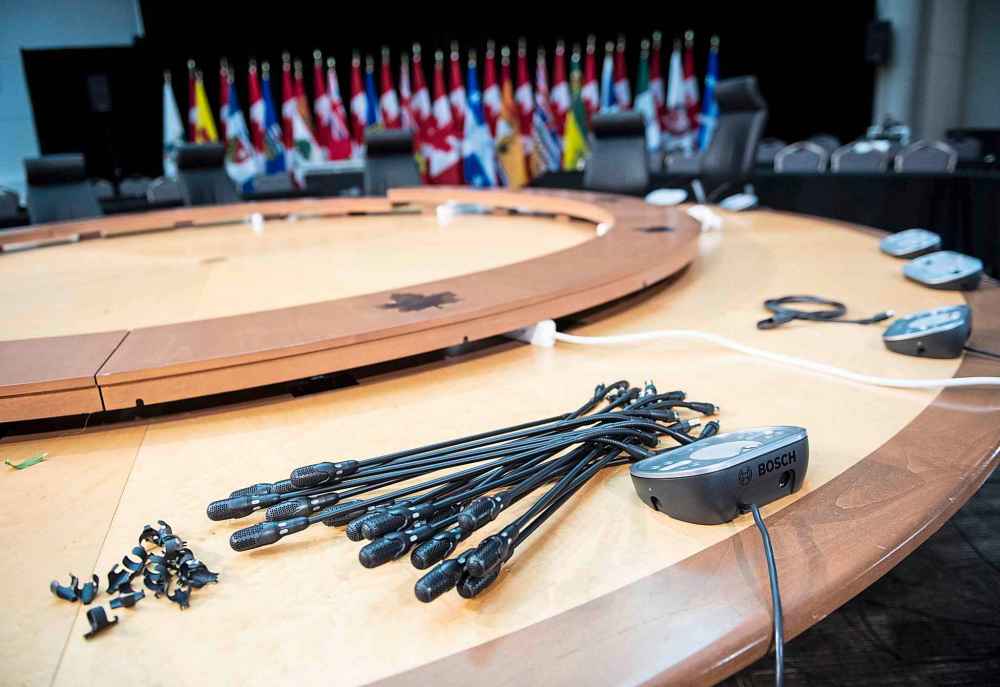 CP
Conference microphones lie disassembled in an Ottawa meeting room where Prime Minister Justin Trudeau was set to attend the First Ministers' Meeting and hold meetings with national Indigenous leaders before it was cancelled due to the COVID-19 outbreak. (Justin Tang / The Canadian Press)