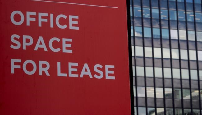 A sign advertises office space available for rent in Ottawa's downtown core in Ottawa, Monday, Aug. 31, 2020. Canadians should brace for a shortage of office furniture, such as desks and chairs, as people continue to study and work from home this fall. THE CANADIAN PRESS/Adrian Wyld