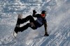 A snowboarder practices for the Big Air Atlanta snowboard and ski competition at SunTrust Park, Thursday, Dec. 19, 2019, in Atlanta. (AP Photo/John Bazemore)