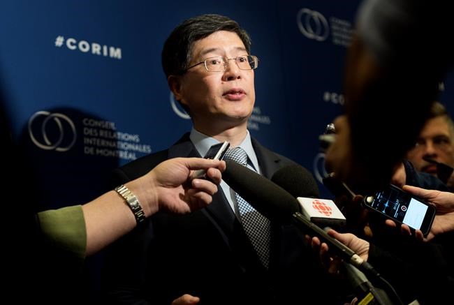 Chinese Ambassador to Canada Cong Peiwu answers reporters questions following a luncheon speech in Montreal, Thursday, December 5, 2019. THE CANADIAN PRESS/Graham Hughes