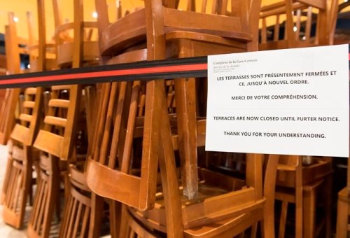 A sign notifying customers of a closed terrace is shown at food court in Montreal, Wednesday, March 18, 2020, as COVID-19 cases rise in Canada and around the world. THE CANADIAN PRESS/Graham Hughes