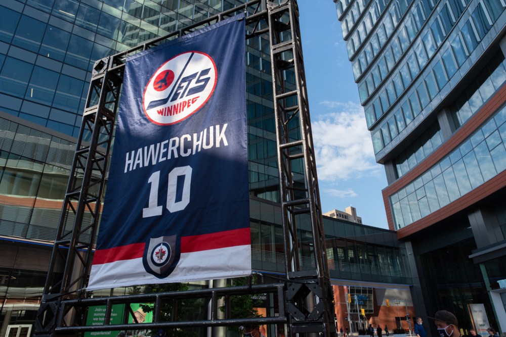 JESSE BOILY  / WINNIPEG FREE PRE
The banner for Dale Hawerchuk was brought down from the rafters and put on display in True North Square to memorialize the former Winnipeg Jet.