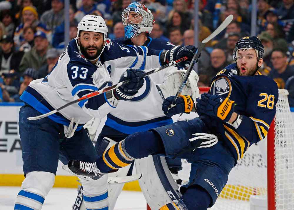 Dustin Byfuglien is undergoing rehabilitation in consultation with the Jets, so it looks like there could be an amicable reunion. (Jeffrey T. Barnes / The Canadian Press files)