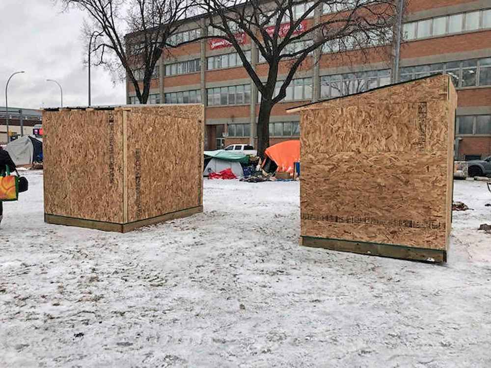 SUPPLIED
The two basic wooden warming huts were donated by the Urban Knights and Ladies Veterans Ambassador Peace Patrol to people living in an encampment along the Disraeli Freeway. But, within a few days of the shelters being delivered to the encampment, they were torn down and taken away by members of the Winnipeg Police Service.
