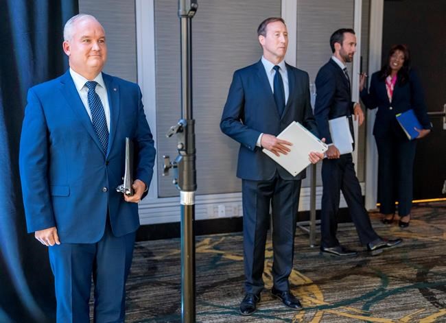 Conservative Party of Canada leadership candidates Erin O'Toole, left to right, Peter MacKay, Derek Sloan and Leslyn Lewis wait for the start of the French Leadership Debate in Toronto on June 17, 2020. THE CANADIAN PRESS/Frank Gunn