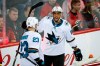 San Jose Sharks' Evander Kane, right, celebrates his goal with teammate Barclay Goodrow during second period NHL hockey action against the Calgary Flames in Calgary on February 4, 2020. A group advocating for diversity in hockey is calling for the NHL to suspend Thursday's playoff games in the aftermath of a police shooting of Jacob Blake, a Black man, in Wisconsin last weekend. San Jose Sharks winger Evander Kane says the Hockey Diversity Alliance has formally requested the NHL suspend a pair of post-season games scheduled for Toronto and Edmonton. THE CANADIAN PRESS/Jeff McIntosh
