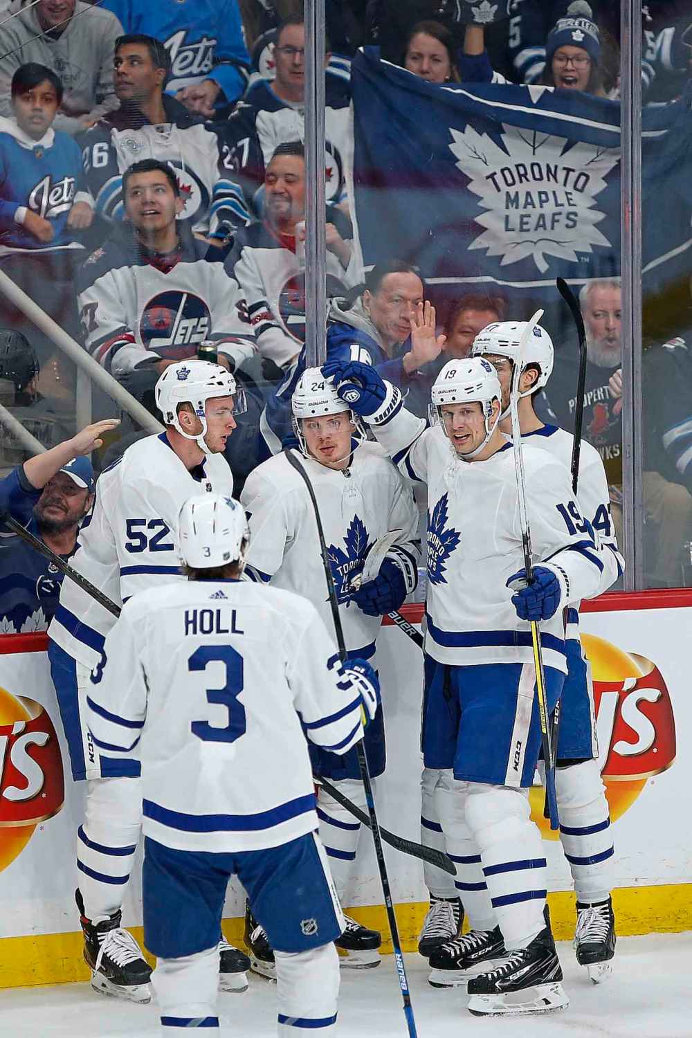 THE CANADIAN PRESS/John Woods
Toronto Maple Leafs players celebrate a goal against the Winnipeg Jets on Thursday. Leafs fans in attendance had plenty to cheer for during the Leafs' 6-3 win at Bell MTS Place.