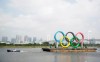 A tugboat moves a symbol installed for the Olympic and Paralympic Games Tokyo 2020 on a barge moved away from its usual spot off the Odaiba Marine Park in Tokyo Thursday, Aug. 6, 2020. Olympic trampoline champion Rosie MacLennan can envision the Tokyo Games going ahead next summer without a COVID-19 vaccine because the NHL, NBA and professional tennis are so far providing successful templates to hold sports events during a pandemic. THE CANADIAN PRESS/AP, Hiro Komae