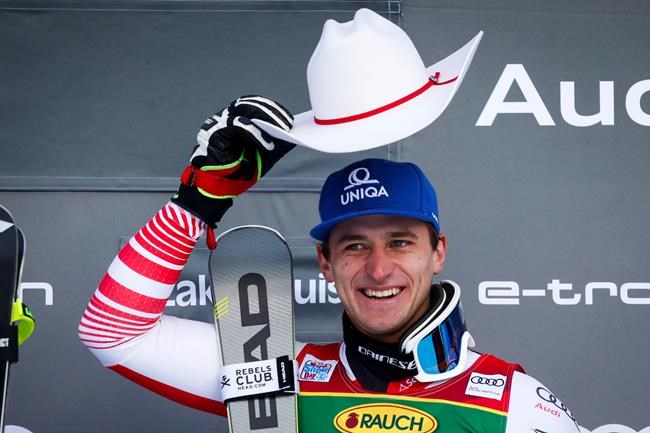 Austria's Matthias Mayer celebrates his victory following the men's World Cup super-G ski race at Lake Louise, Alta., Sunday, Dec. 1, 2019.THE CANADIAN PRESS/Jeff McIntosh