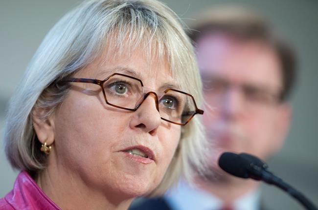 British Columbia Health Minister Adrian Dix looks on as Provincial Health Officer Dr. Bonnie Henry addresses the media during a news conference at the BC Centre of Disease Control in Vancouver B.C, Tuesday, January 28, 2020. Dix and Dr. Henry announced Tuesday that British Columbia has confirmed its first case of coronavirus and the person in question is being treated. THE CANADIAN PRESS/Jonathan Hayward