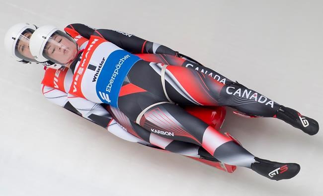 Caitlin Nash and Natalie Corless, of Whistler, B.C., Canada are seen during the first run of doubles luge during the Viessmann Luge World Cup in Whistler, B.C., Saturday, Dec. 14, 2019. Nash and Corless are the first all woman double luge team in the history of the sport. THE CANADIAN PRESS/Jonathan Hayward