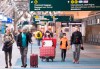 Travellers are seen at Vancouver International Airport in Richmond, B.C. Friday, March 13, 2020. The Canada Border Services Agency says it is adding new screening questions for travellers arriving in Canada, asking whether they have symptoms of COVID-19. THE CANADIAN PRESS/Jonathan Hayward