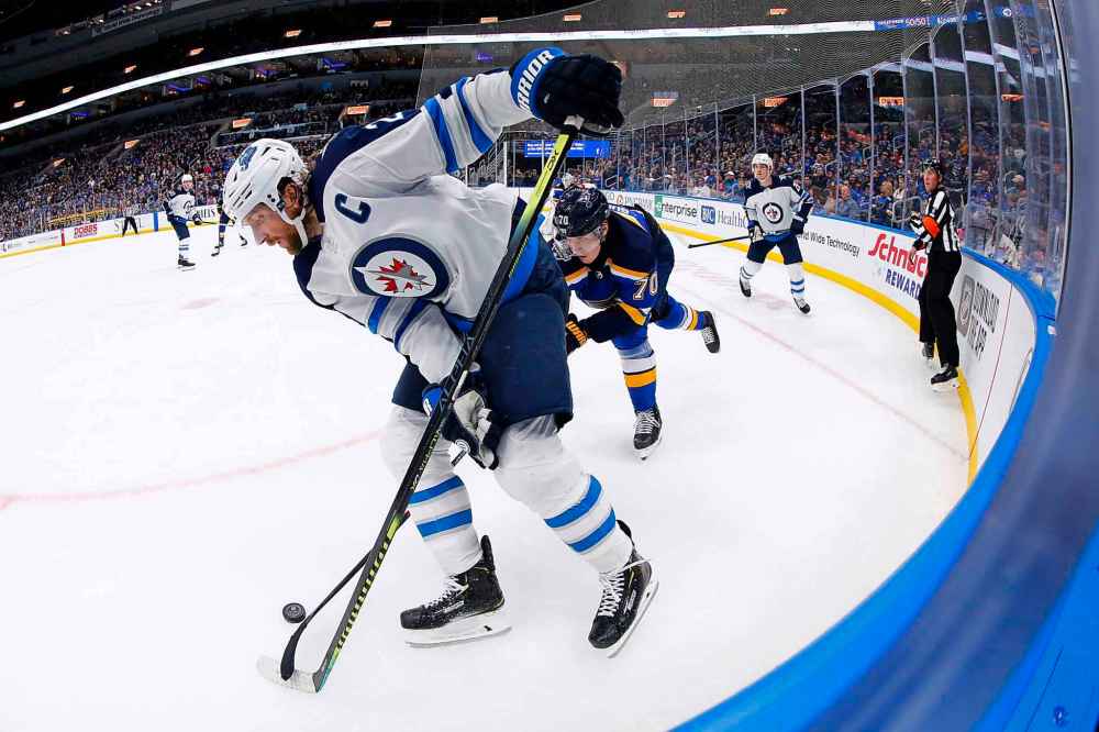 Captain Blake Wheeler has been leading by example, including moving to centre when Bryan Little went down with an injury last month. (Dilip Vishwanat / The Associated Press)