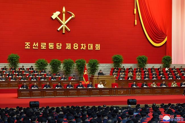 In this photo provided by the North Korean government, North Korean leader Kim Jong Un, center, attends a ruling party congress in Pyongyang, North Korea Thursday, Jan. 7, 2021. Kim has reviewed relations with rival South Korea and underscored the need to drastically improve its ties with the outside world as he addressed a major political conference for the third consecutive day, state media reported Friday. Independent journalists were not given access to cover the event depicted in this image distributed by the North Korean government. The content of this image is as provided and cannot be independently verified. Korean language watermark on image as provided by source reads: