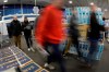 Shoppers enter a Best Buy store for a Black Friday sale Thursday, Nov. 28, 2019, in Overland Park, Kan. (AP Photo/Charlie Riedel)