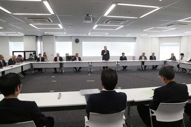 Tokyo 2020 Organizing Committee President Yoshiro Mori, center at rear, speaks during the first meeting of the “Tokyo 2020 New Launch Task Force