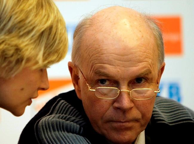 FILE - In this Friday, Feb. 13, 2009 file photo, Anders Besseberg, president of International Biathlon Union, or IBU, right, listens to IBU Secretary General Nicole Resch before a press conference of the IBU Biathlon World Championships in Pyeongchang, east of Seoul, South Korea, A report commissioned by the International Biathlon Union stated Thursday Jan. 28, 2021, there is evidence of “systematic corrupt and unethical conduct at the very top