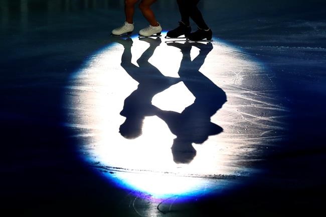 FILE - In this Sunday, Jan. 26, 2020 file photo, Victoria Sinitsina and Nikita Katsalapov of Russia perform during the gala exhibition at the ISU European figure skating championships in Graz, Austria. The European figure skating championships were canceled Thursday Dec. 10, 2020 for the first time in more than 70 years because of the coronavirus pandemic. (AP Photo/Matthias Schrader, File)