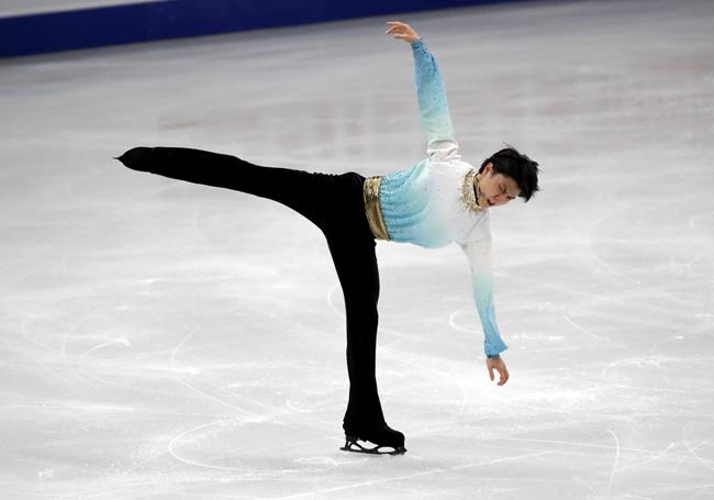 Japan's Yuzuru Hanyu performs during the men's single short program competition in the ISU Four Continents Figure Skating Championships in Seoul, South Korea, Friday, Feb. 7, 2020. (AP Photo/Lee Jin-man)