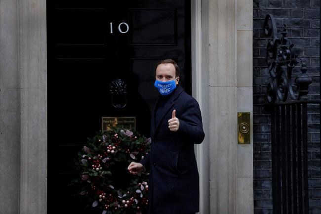 Britain's Health Secretary Matt Hancock arrives at Downing Street in London, Wednesday, Dec. 2, 2020. U.K. Health Secretary Matt Hancock on Wednesday thanked scientists from Pfizer and BioNTech after the approval of their COVID-19 vaccine for emergency use by the country's drugs regulator. Speaking earlier Hancock gave details of how the vaccine would be distributed from the beginning of next week. (AP Photo/Kirsty Wigglesworth)