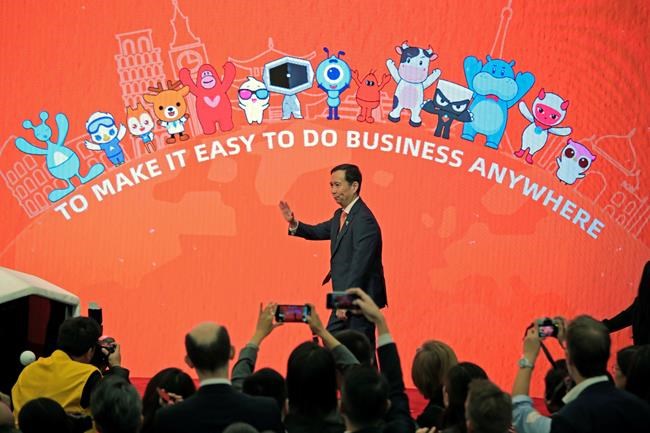 FILE - In this file photo dated Tuesday, Nov. 26, 2019, Chairman and CEO of Alibaba Group Daniel Zhang Yong attends the Alibaba Group's listing ceremony at the Hong Kong Stock Exchange (HKEX) in Hong Kong. Known globally as an online retail platform, Alibaba chief marketing officer Chris Tung announced Wednesday Jan. 15, 2020, plans to change how broadcasters, fans and organizers experience the Olympic Games. (AP Photo/Kin Cheung, FILE)