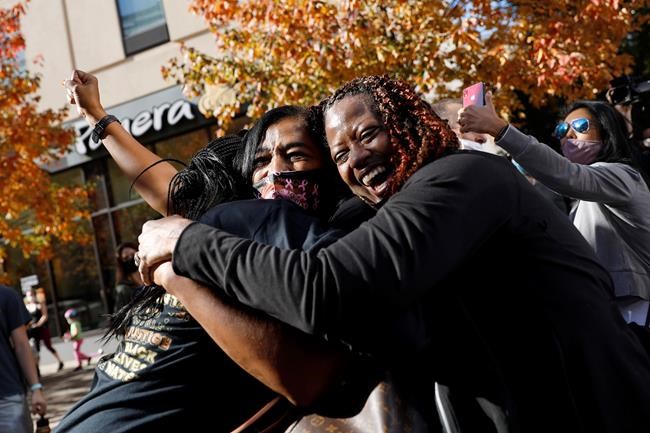 People celebrate Saturday, Nov. 7, 2020, in Philadelphia, after Democrat Joe Biden defeated President Donald Trump to become 46th president of the United States. (AP Photo/Rebecca Blackwell)