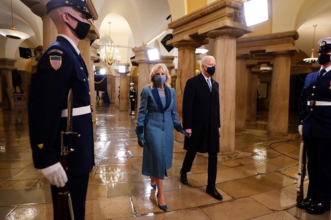 President-elect Joe Biden and Dr. Jill Biden arrive in the Crypt of the US Capitol for Biden's inauguration ceremony on Wednesday, Jan. 20, 2021 in Washington. (Jim Lo Scalzo (Jim Lo Scalzo/Pool Photo via AP)