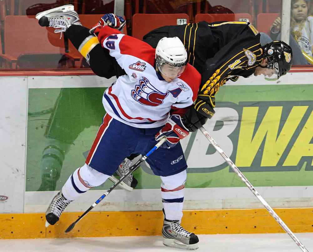 Colin Corneau / Brandon Sun Files
Jared Spurgeon during his time in junior with the Spokane Chiefs of the WHL, foreground, was the most popular player on the team.